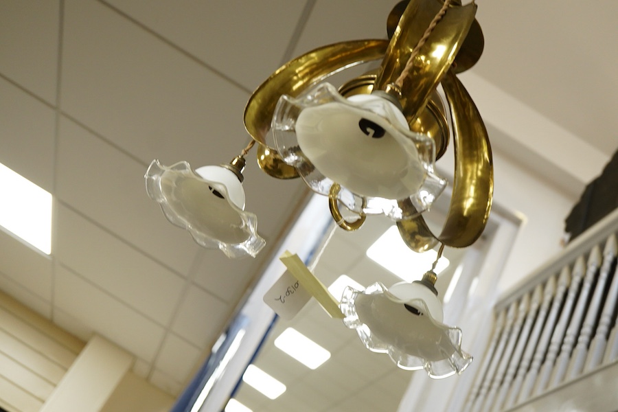 A late 19th century decorative brass, three branch hanging light, with fluted glass shades, 63cm high
